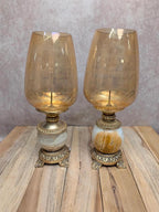 Paire de bougeoirs vintage onyx et laiton avec globes en verre ambré
