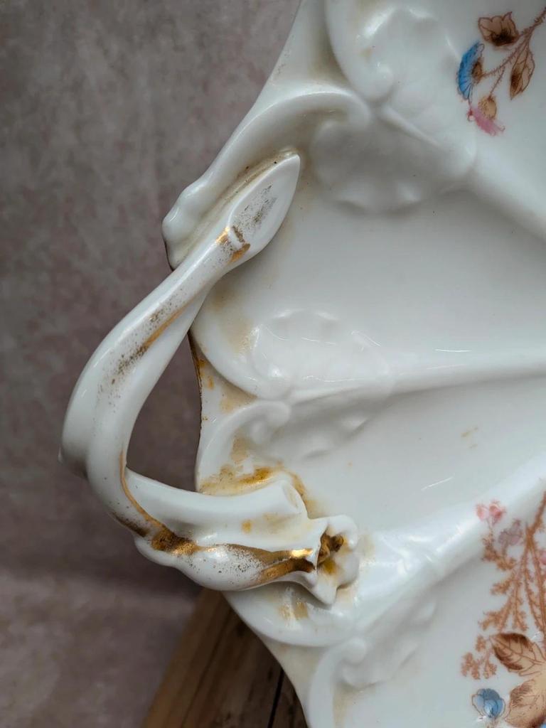 Plat ancien en porcelaine J.p.l France