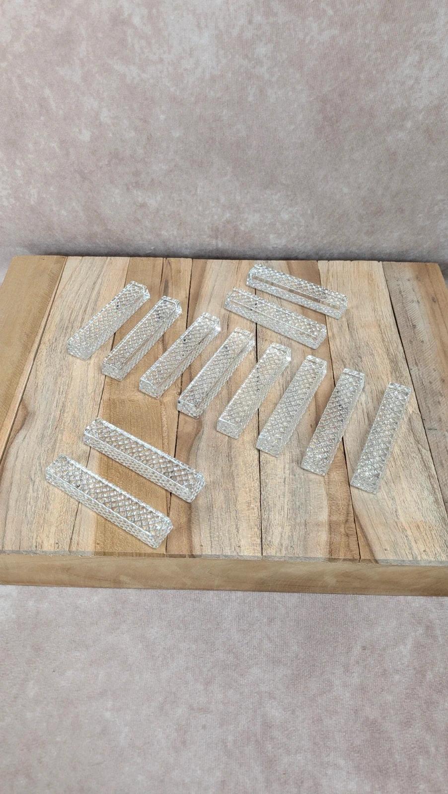 Lot de 12 porte-couteaux en verre taillé