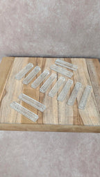 Lot de 12 porte-couteaux en verre taillé