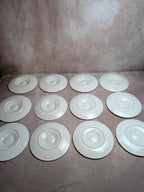 Service 12 assiettes + plat à huîtres Longchamp barbotine coquille