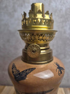 Lampe à pétrole ancienne en faïence décor oiseau et insectes fin Xixe