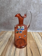 Bouteille ancienne en verre soufflé rose décor floral émaillé à la main