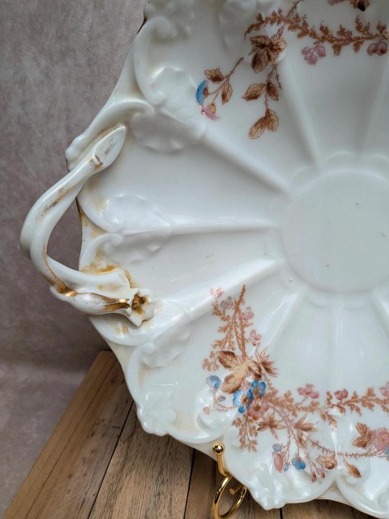 Plat ancien en porcelaine J.p.l France