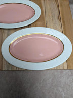 Lot de 2 petits plats ovales terre de fer L’amandinoise modèle Excellence rose et doré
