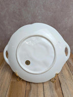 Assiette ancienne en barbotine motif oranges
