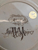 Assiette ancienne en terre de fer Sarreguemines modèle Papillon