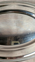 Grand plat ovale en inox vintage