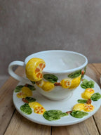 Lot de 2 tasses et 2 soucoupes en barbotine décor citrons