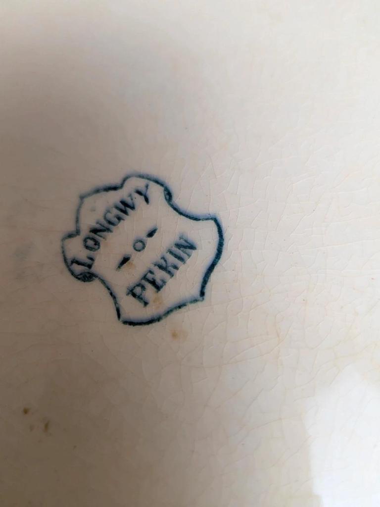 Plat ovale ancien en terre de fer Longwy modèle Pékin