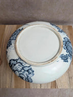 Petit broc joufflu ancien en terre de fer – décor floral bleu