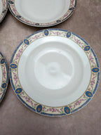Lot 6 assiettes creuses porcelaine de Limoges décor floral bleu et rose