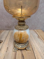Paire de bougeoirs vintage onyx et laiton avec globes en verre ambré