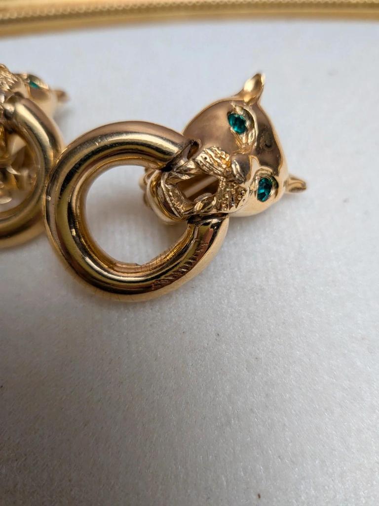 Boucles d’oreilles Givenchy panthère vintage années 80 doré yeux verts Swarovski