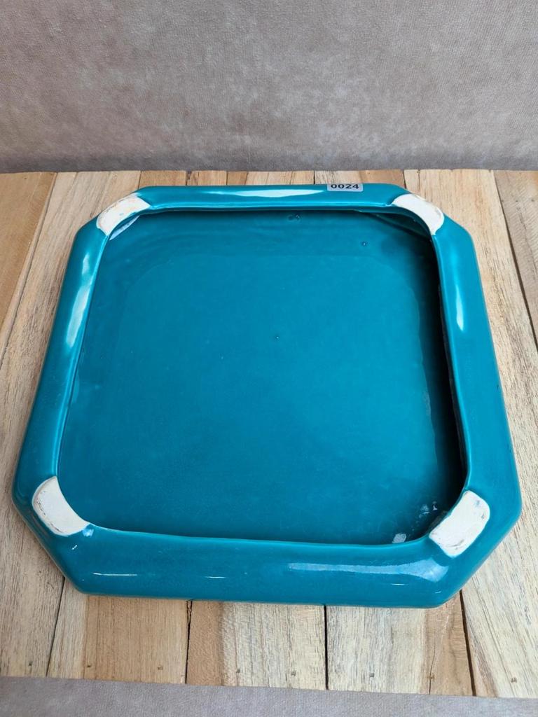 Dessous de plat vintage en céramique émaillée turquoise