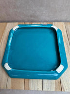 Dessous de plat vintage en céramique émaillée turquoise