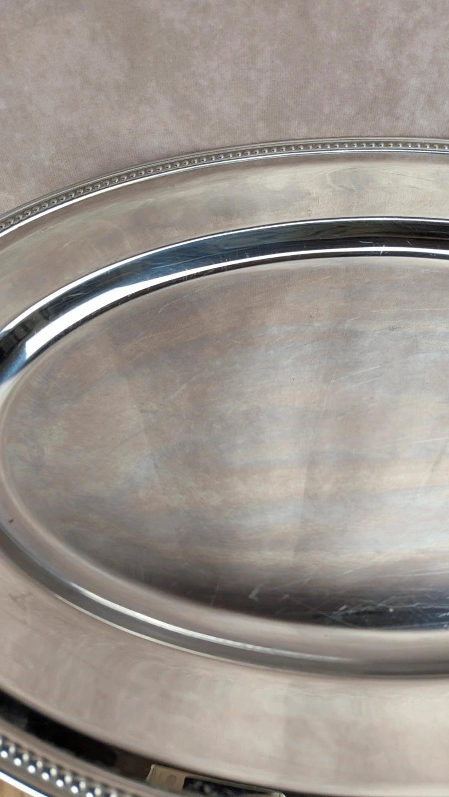 Grand plat ovale en inox vintage