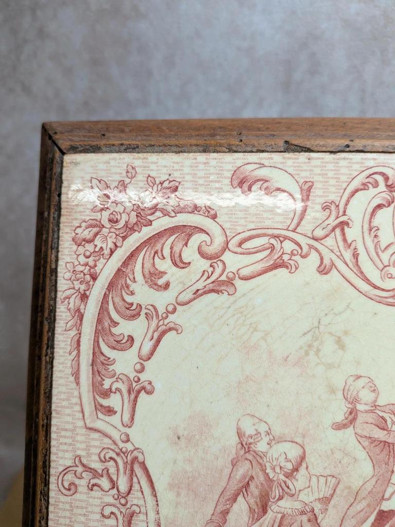 Ancien dessous de plat Gien en terre de fer – Colin-maillard