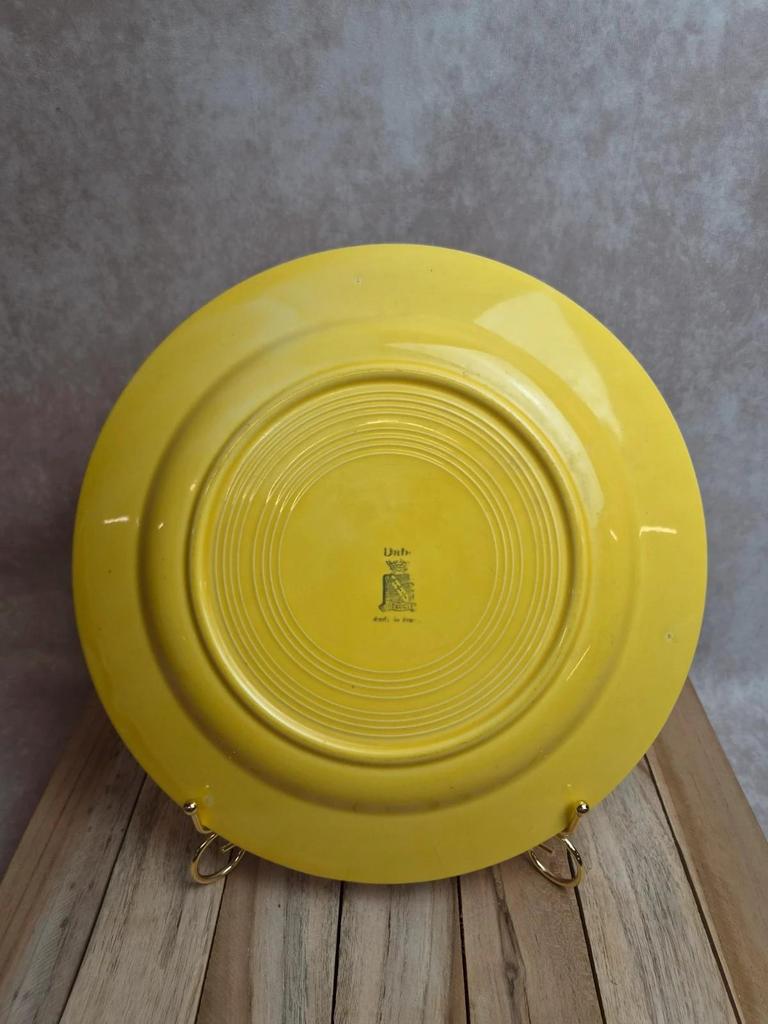 Grand plat rond Niderviller jaune décor floral