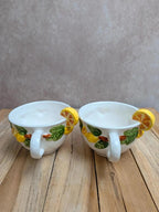 Lot de 2 tasses et 2 soucoupes en barbotine décor citrons