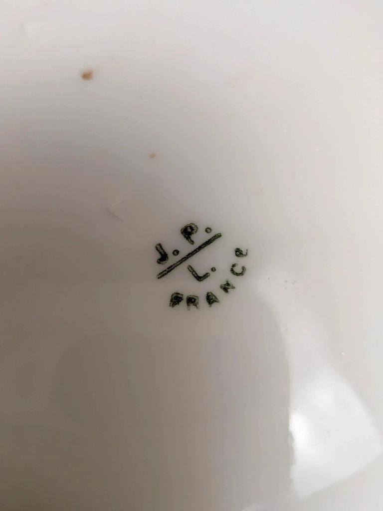 Plat ancien en porcelaine J.p.l France