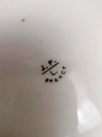 Plat ancien en porcelaine J.p.l France