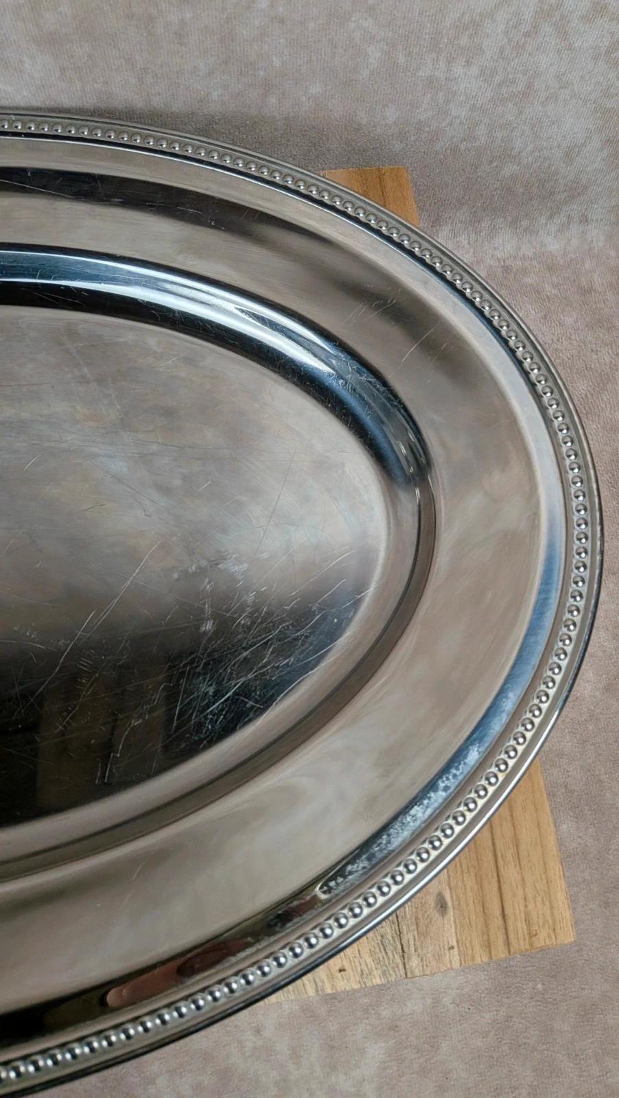 Grand plat ovale en inox vintage