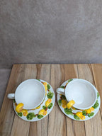 Lot de 2 tasses et 2 soucoupes en barbotine décor citrons