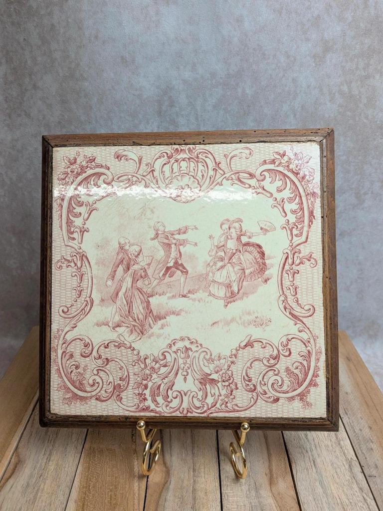 Ancien dessous de plat Gien en terre de fer – Colin-maillard
