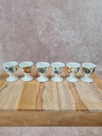 Lot de 6 coquetiers anciens en porcelaine de Paris + support bois