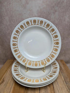 4 assiettes creuses Limoges dorure