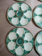 Service 12 assiettes + plat à huîtres Longchamp barbotine coquille