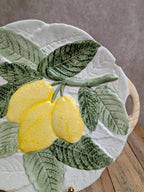 Assiette ancienne en barbotine motif citrons