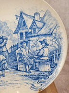 🍷 Assiette publicitaire ancienne décor bleu d’après Téniers – 100.000 Chemises Paris