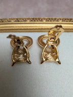 Boucles d’oreilles Givenchy panthère vintage années 80 doré yeux verts Swarovski