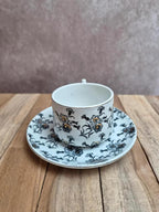 Tasse et soucoupe anciennes Gien – terre de fer – décor floral doré