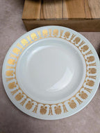 4 assiettes creuses Limoges dorure