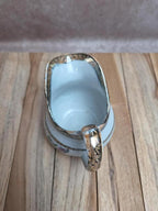 Théière ancienne et pot à lait assorti au joli décor fleuri rose et turquoise