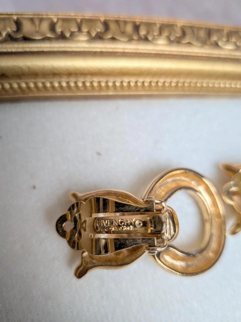 Boucles d’oreilles Givenchy panthère vintage années 80 doré yeux verts Swarovski