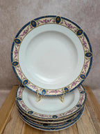 Lot 6 assiettes creuses porcelaine de Limoges décor floral bleu et rose