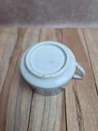 Ancienne tasse à café Terre de Fer bleue – attribuée au modèle Dentelle de Lunéville