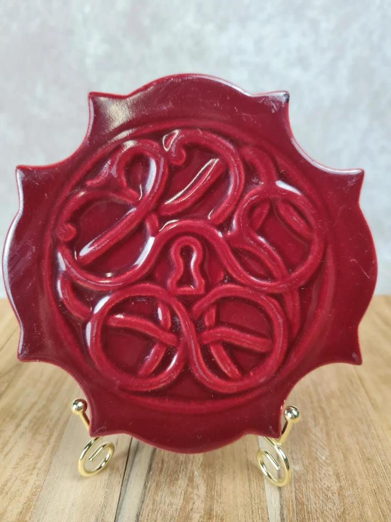 Dessous de bouteille en céramique rouge signé Cab Bordeaux 🍷