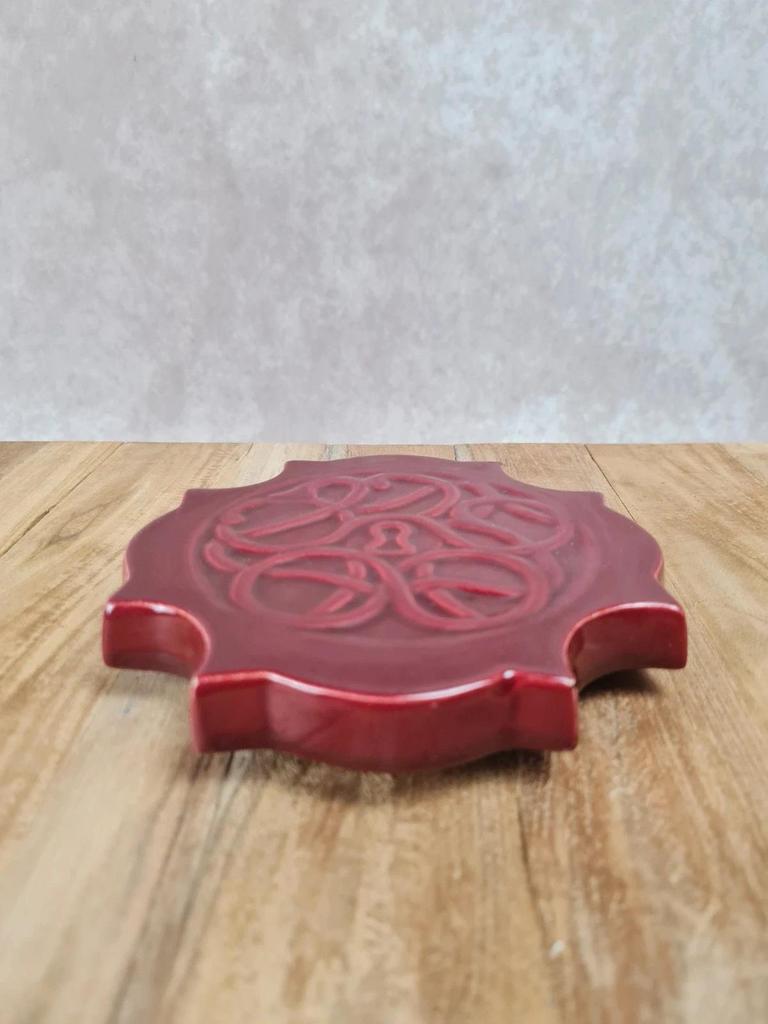 Dessous de bouteille en céramique rouge signé Cab Bordeaux 🍷