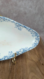 Ravier ancien en terre de fer – décor bleu