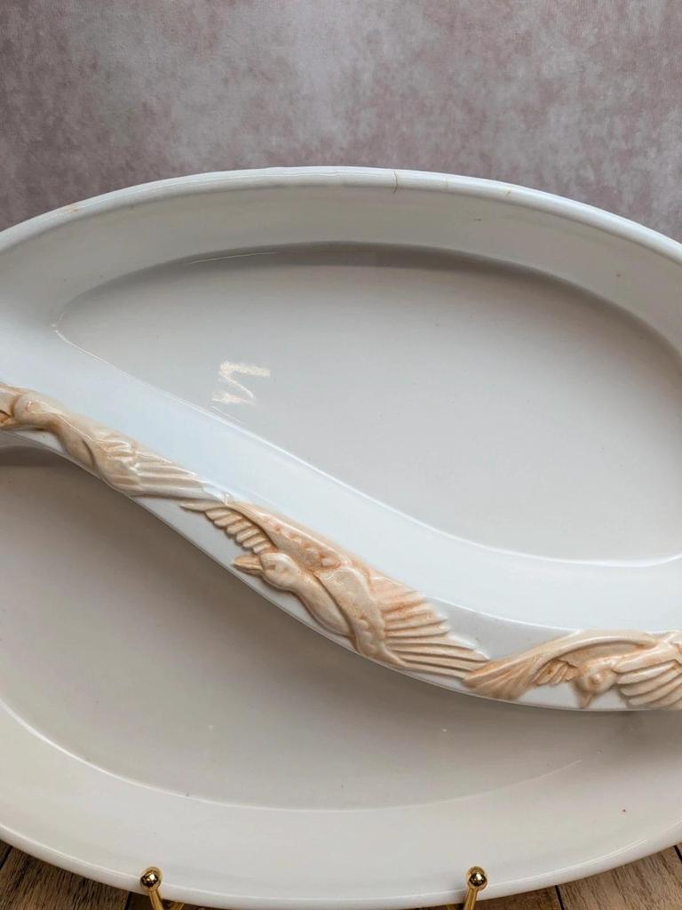 Grand plat vintage en barbotine décor canards