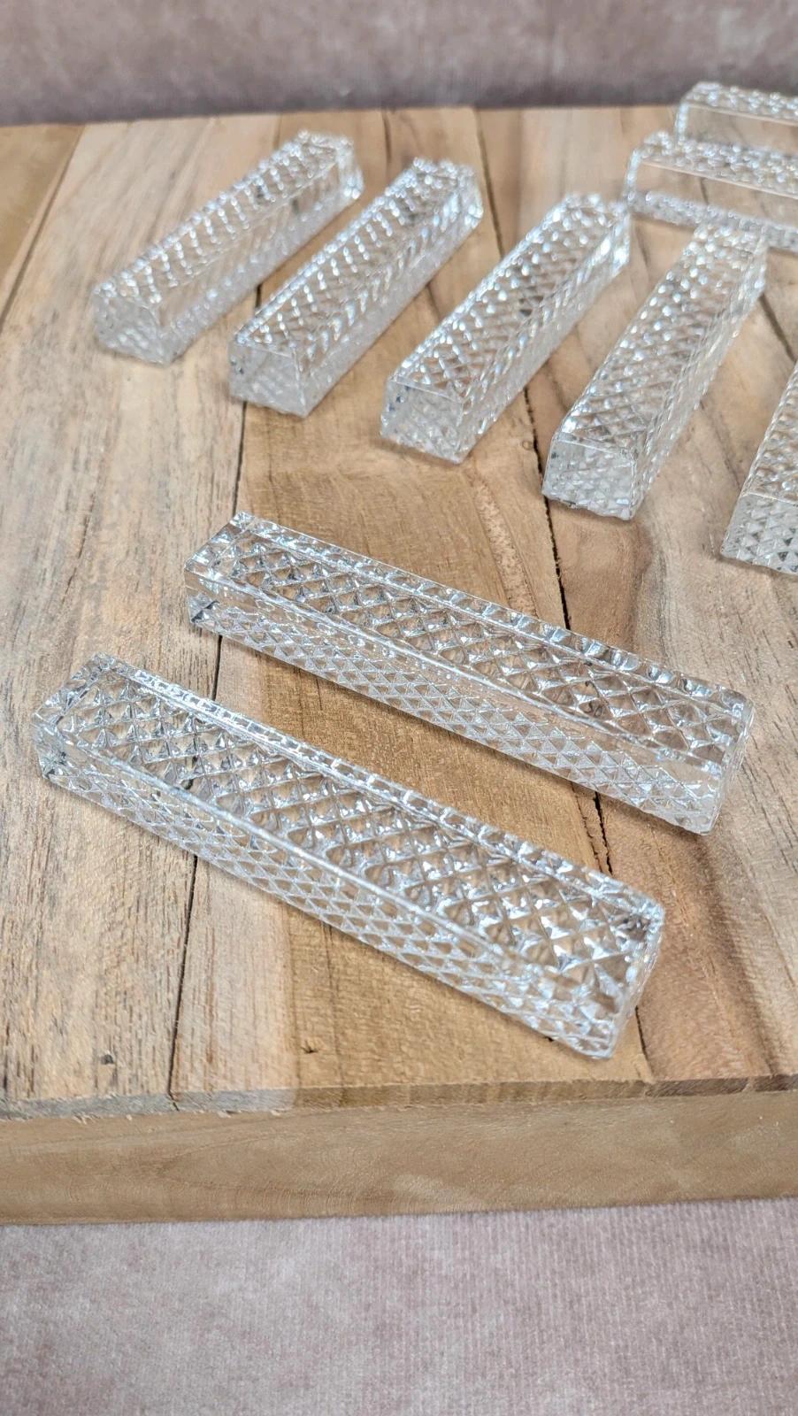 Lot de 12 porte-couteaux en verre taillé