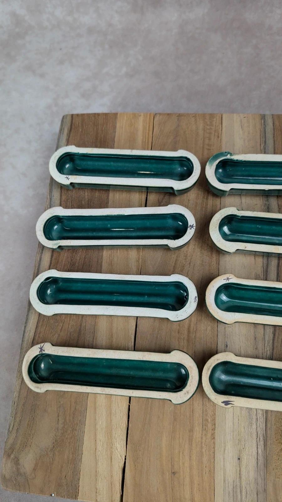 Lot de 12 porte - couteaux Art Déco