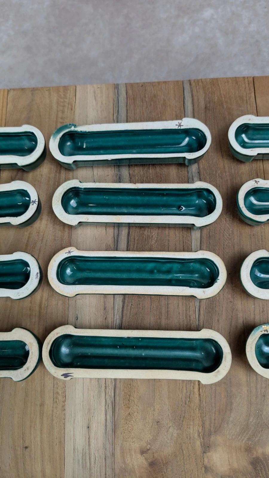 Lot de 12 porte - couteaux Art Déco