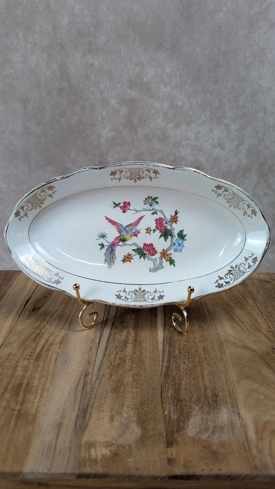 Plat ovale ancien Kg Lunéville – décor oiseau & fleurs dorées