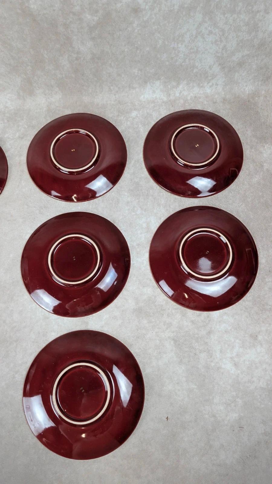 Service à dessert bordeaux et or attribué à Saint - clément